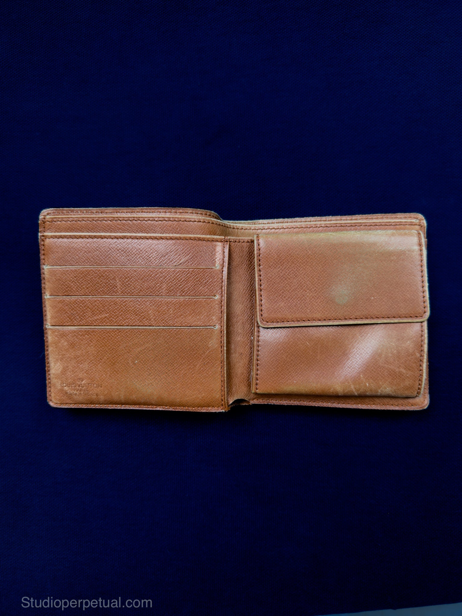 Louis Vuitton Monogram Bi-Fold Wallet