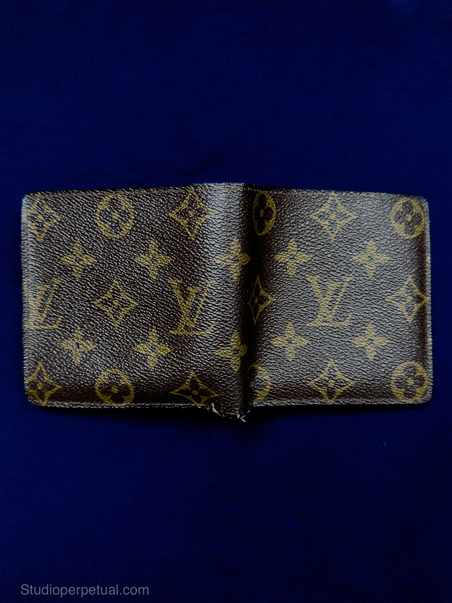 Louis Vuitton Monogram Bi-Fold Wallet